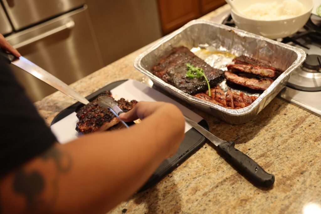 1K6A3551 Medium Rich Yang Cutting and Serving his barbecue