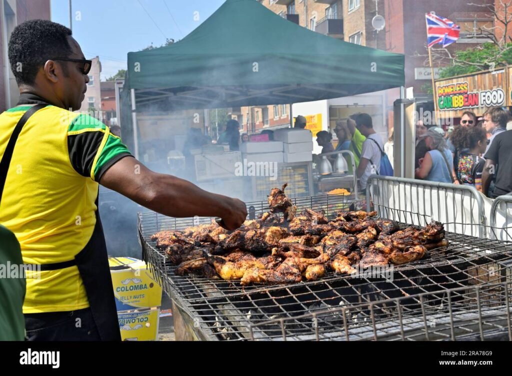 st-pauls-caribbean-carnival-2023-bristol-england-uk-1-july-2023-cooking-some-delicious-chicken-over-bbq-2RA78G9 - BBQ News